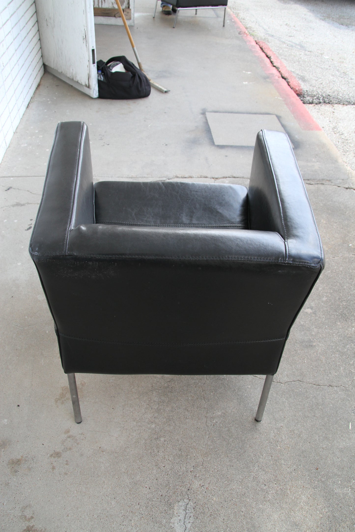 Black leather lounge chairs