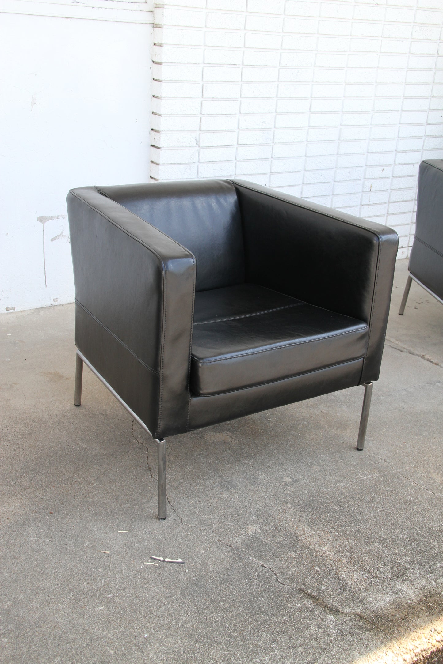 Black leather lounge chairs