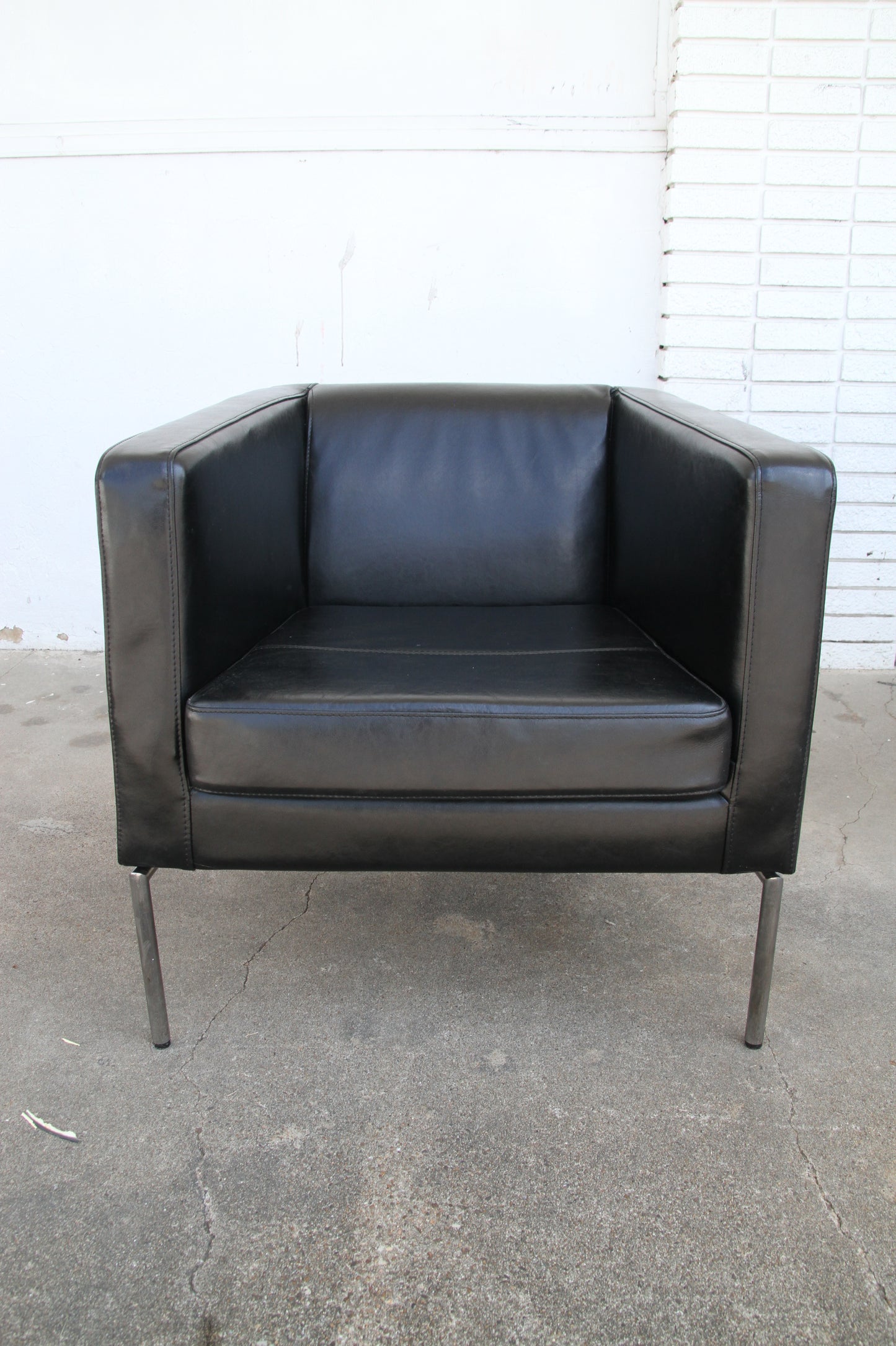 Black leather lounge chairs