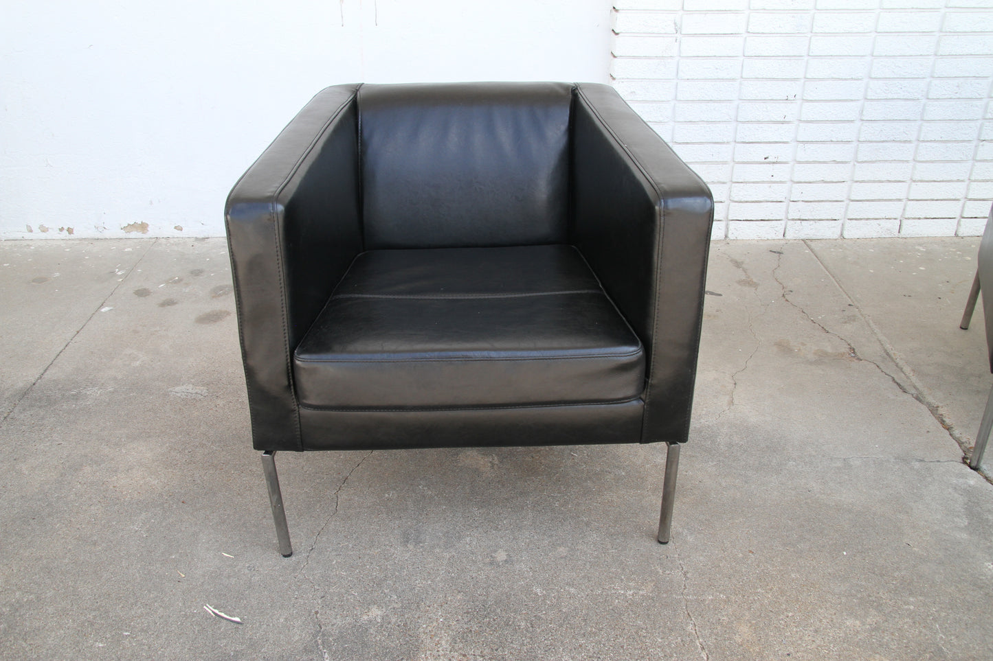 Black leather lounge chairs