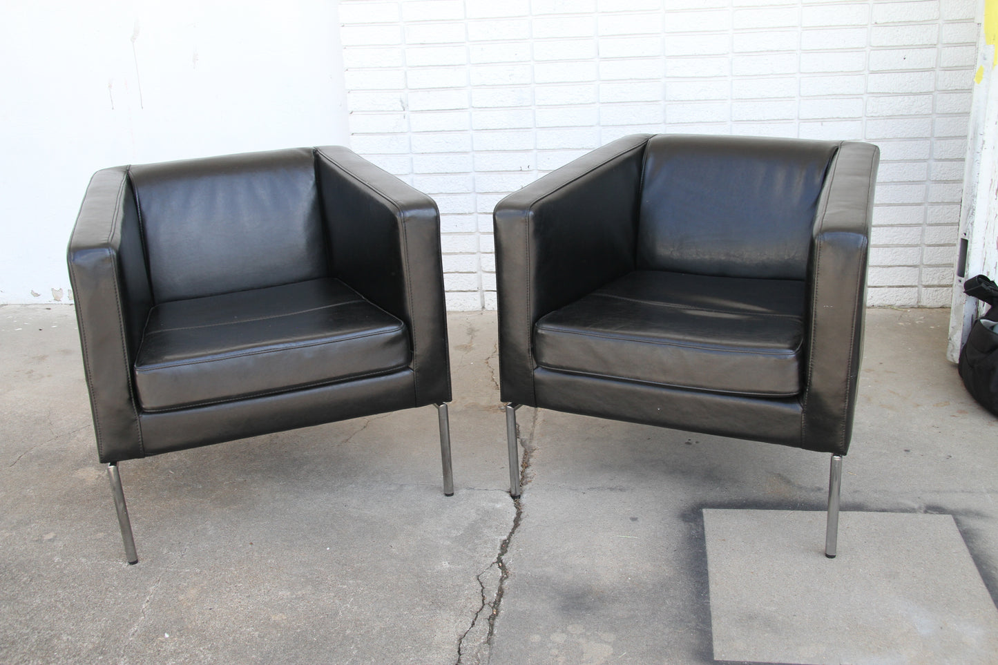 Black leather lounge chairs