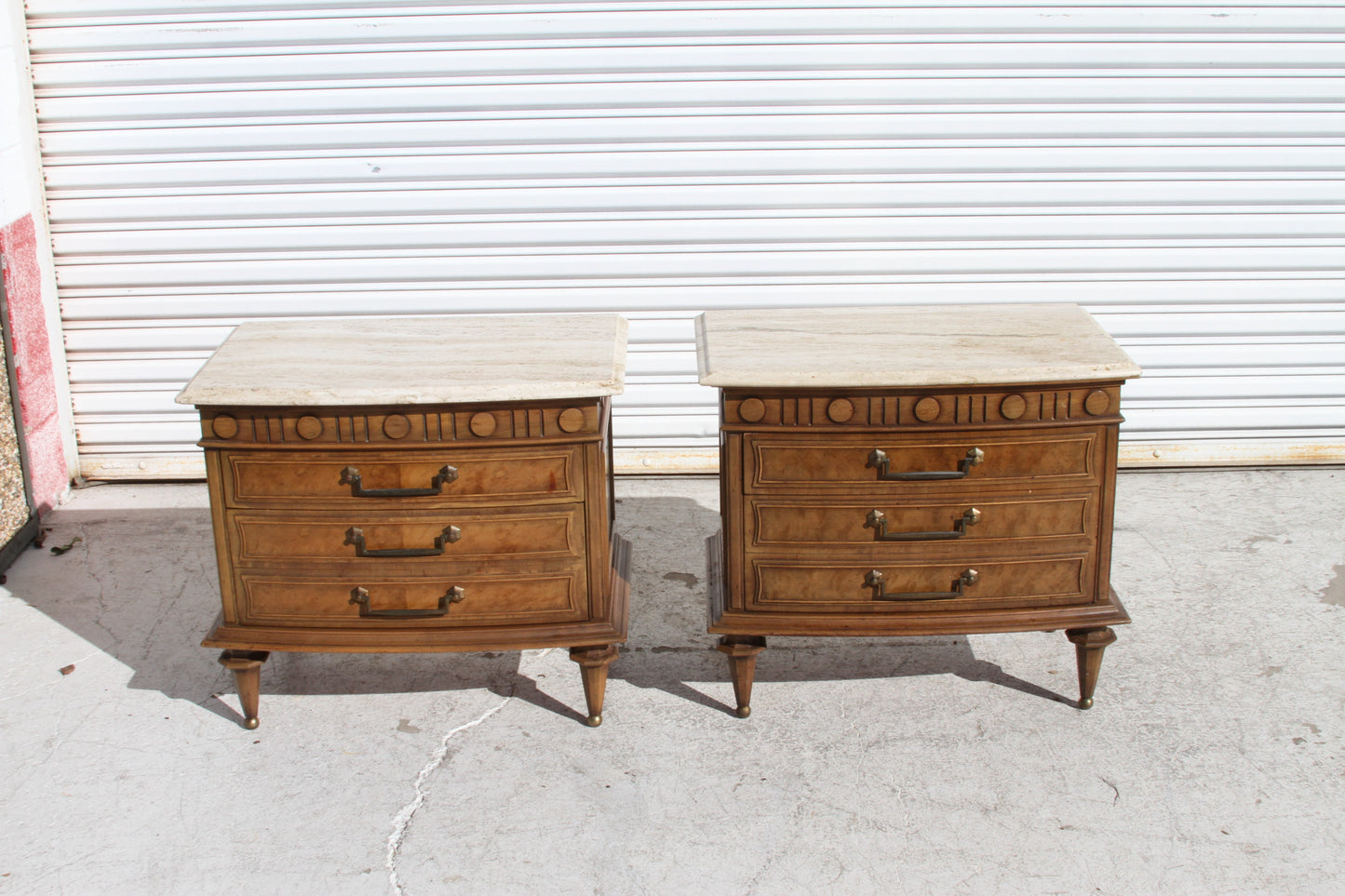 Experience modern luxury with these Italian Travertine marble top nightstands. This set of 2 nightstands adds a touch of elegance to your bedroom.