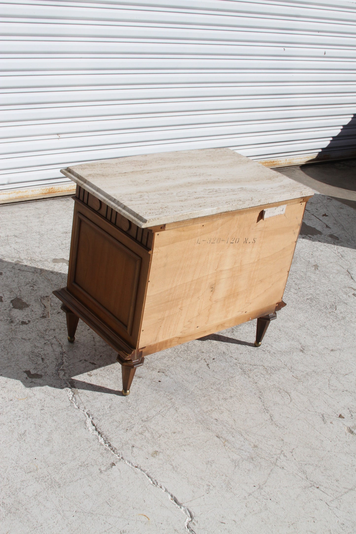 The ultimate in modern luxury with these Italian Travertine marble top nightstands. Expertly crafted with attention to detail, they're a statement piece for your stylish space.