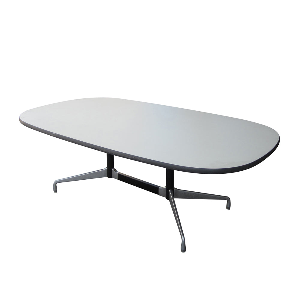 Mid Century Modern Eames Racetrack Conference Table  combines style with practicality. The racetrack shape provides ample space for collaborative meetings while maintaining a refined aesthetic that enhances any workspace.