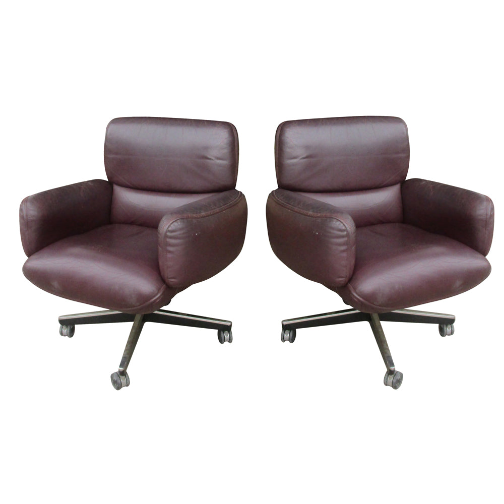 Stylish Knoll executive chairs: Burgundy upholstery, adjustable features, ideal for conference rooms.