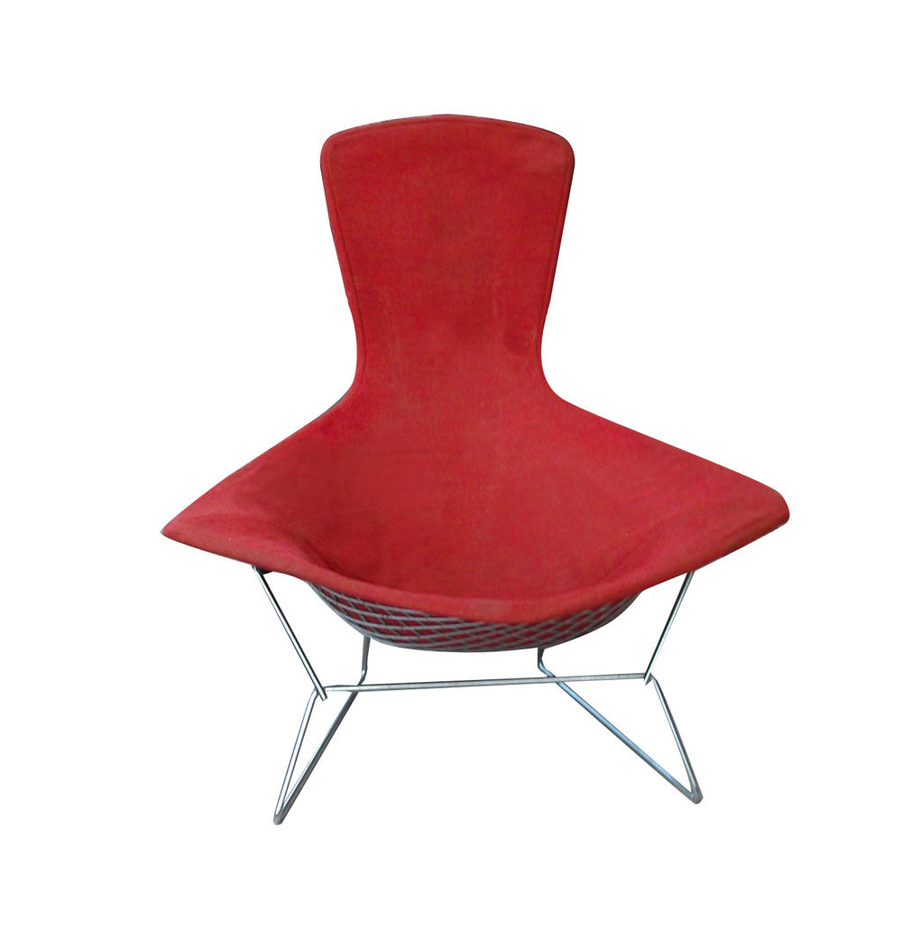 Red in color Mid Century Bertoia Bird Lounge Chair, showcasing iconic mid-century design, sculptural appeal, and premium comfort for modern living spaces.