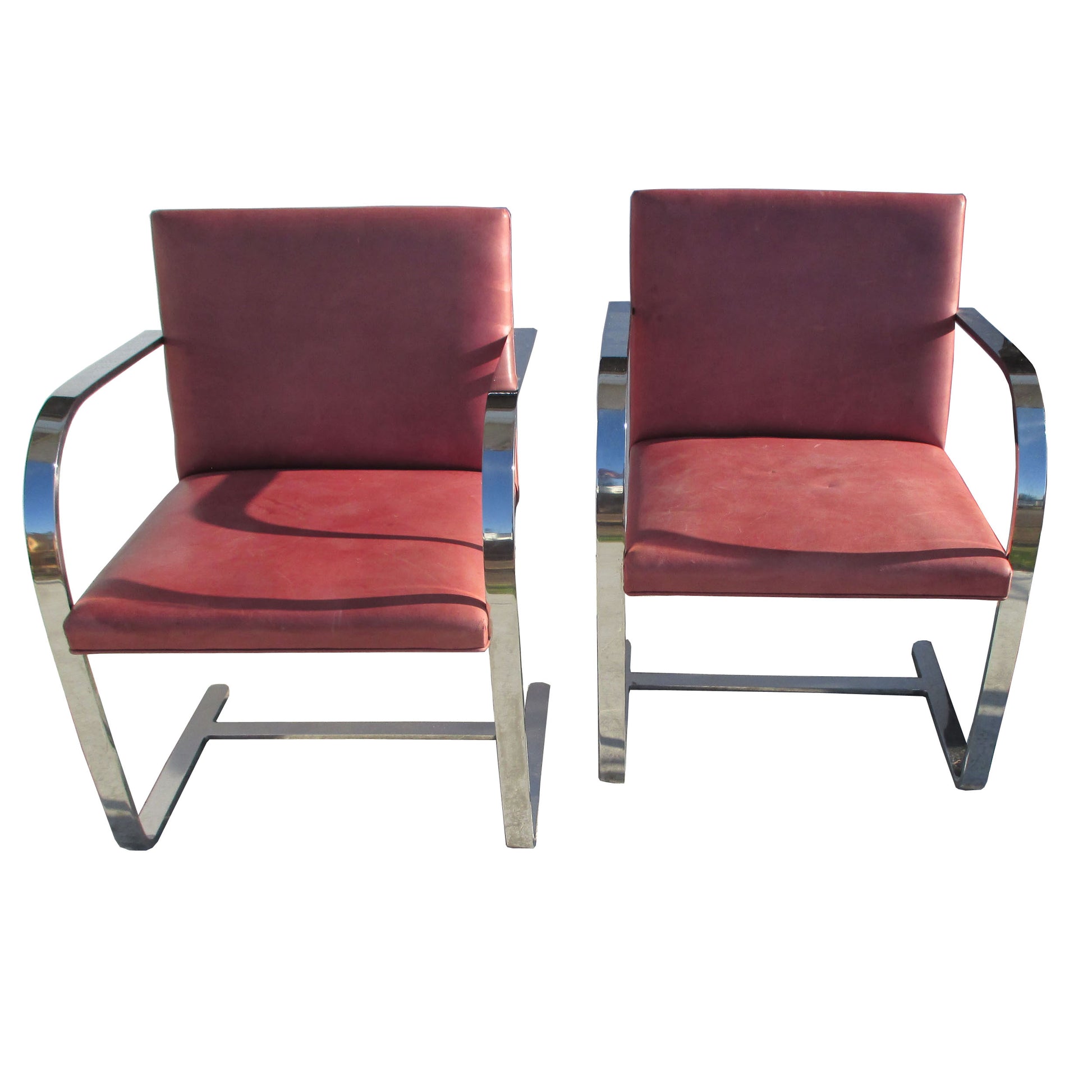 Red Brno Stainless Steel Flat Bar Chairs, offering a blend of retro aesthetics and ergonomic design, perfect for modern homes and commercial settings.