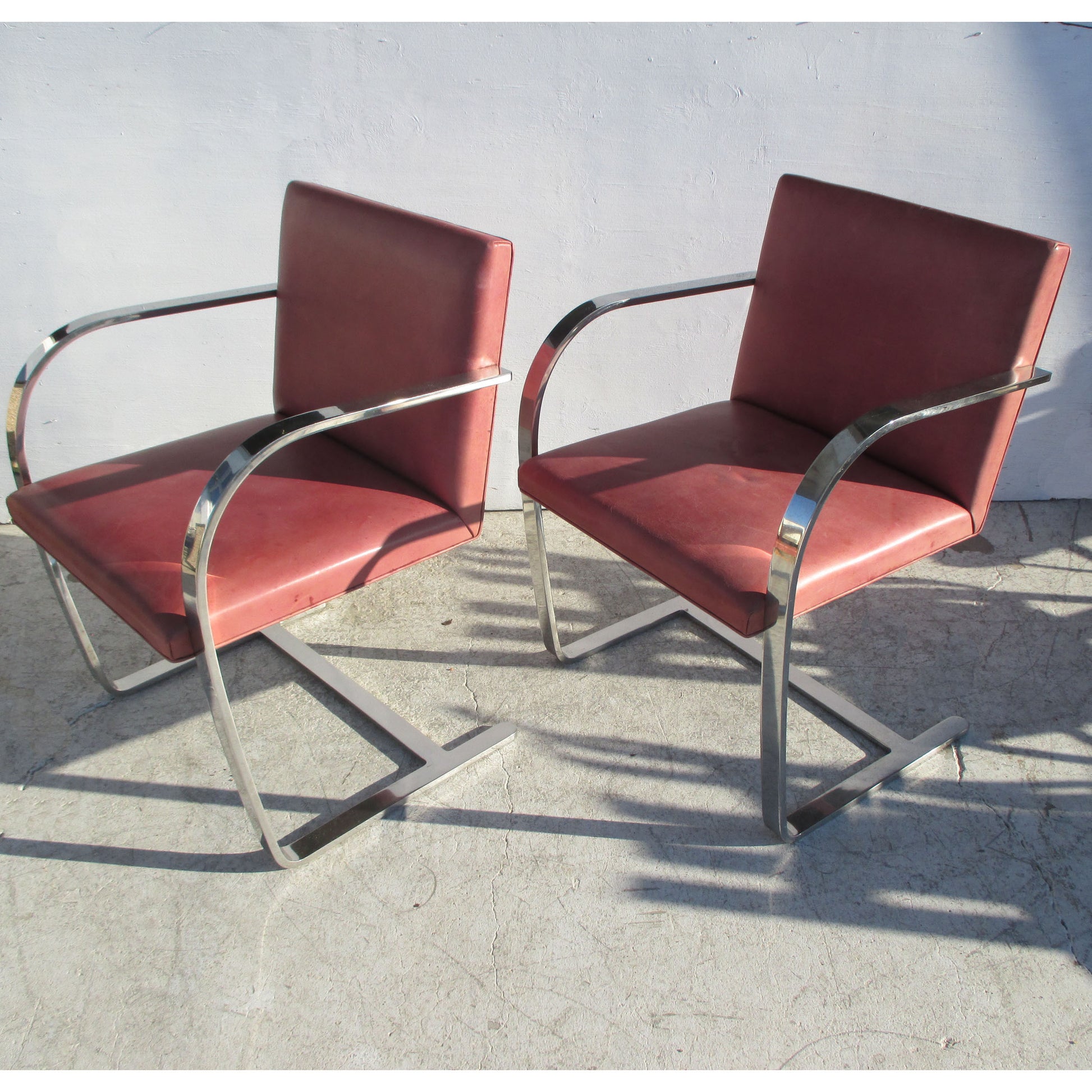 Red Brno Stainless Steel Flat Bar Chairs, suitable for dining, lounging, or reception areas, adding a pop of color and sophistication to any room.