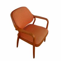 Orange Don Pettit Arm Chair by Knoll, blending contemporary design with bold color for a stylish statement piece.