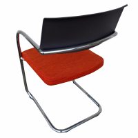 Knoll Arm Chair, blending contemporary design with timeless appeal, ideal for lounges, libraries, and private offices.