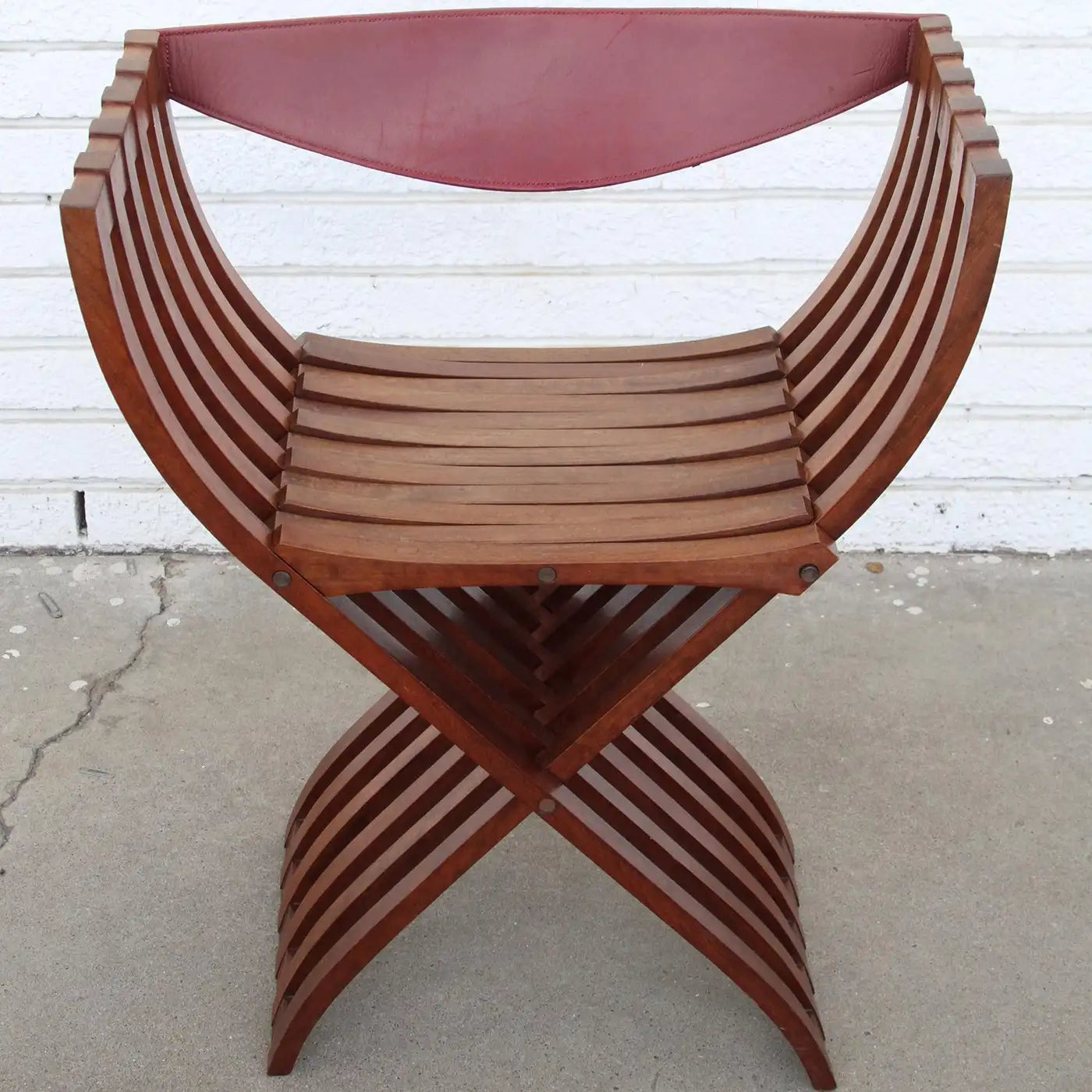 1 Curule Chair in the Style of Pierre Paulin