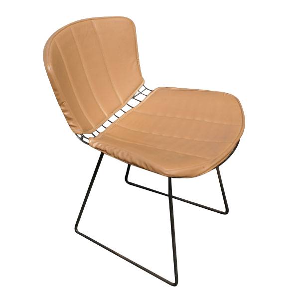 Caramel Bertoia's celebrated wire side chair for Knoll. Innovative lattice design, sleek black or white finish. Sculptural, comfortable seating for modern interiors.