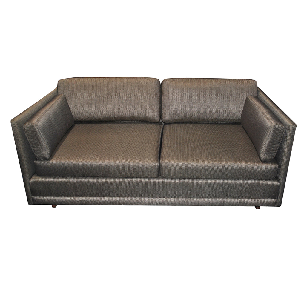 Mid Century Loveseat reminiscent of the Knoll Pfister Style, boasting a sturdy frame, tufted cushions, and sleek armrests for a luxurious seating experience.